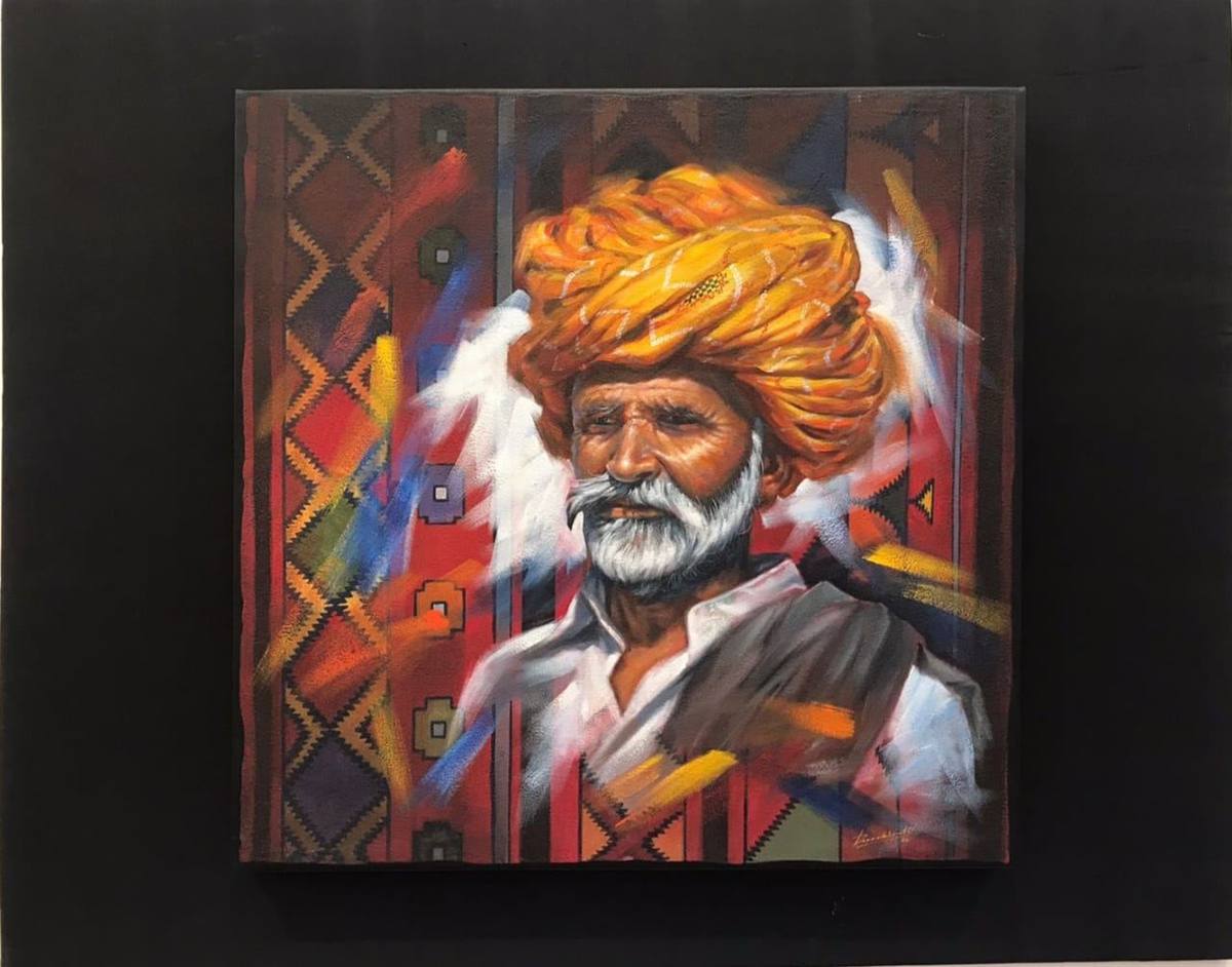 Portrait of an elder in a traditional orange turban